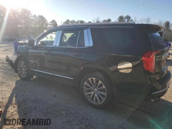 2021 GMC Yukon Denali with VIN 1GKS2DKL5MR171592, listed as a Copart auction lot 88767015 with 62,674 mi miles and Salvage Title. Bid and sale history available at carsss.com. Image 2.