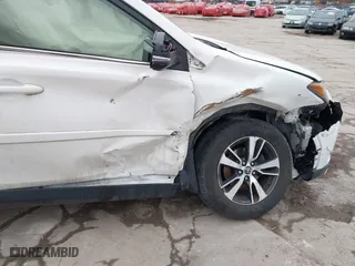 2018 Toyota RAV4 XLE with VIN JTMRFREV6JJ734927, listed as a IAAI auction lot 41510616 with 119,687 mi miles. Bid and sale history available at carsss.com. Image 6.