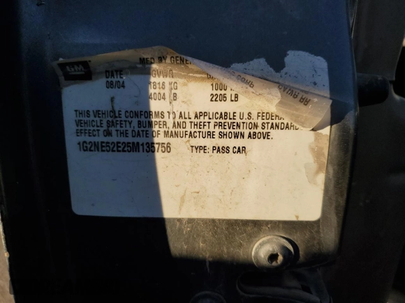 2005 Pontiac Grand Am SE with VIN 1G2NE52E25M135756, listed as a Copart auction lot 79969414 with 128,576 mi miles and Salvage Title. Bid and sale history available at carsss.com. Image 14.