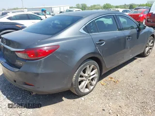 2014 Mazda Mazda6 i Touring with VIN JM1GJ1V6XE1154862, listed as a IAAI auction lot 42052904 with 301,752 mi miles. Bid and sale history available at carsss.com. Image 4.