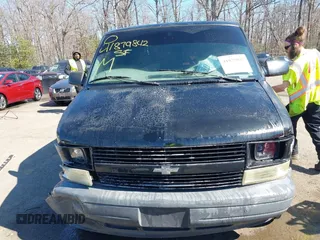 2004 Chevrolet Astro Cargo with VIN 1GCDM19X04B123352, listed as a IAAI auction lot 41879842 with 197,916 mi miles. Bid and sale history available at carsss.com. Image 12.