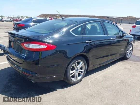 2016 Ford Fusion Titanium Hybrid z VIN 3FA6P0RUXGR123445, wystawiony jako IAAI lot #42606596 z przebiegiem 145 541 mil mil oraz . Historia ofert i sprzedaży dostępna na DreamBid. Obrazek 4.