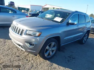 2014 Jeep Grand Cherokee Overland with VIN 1C4RJFCGXEC162238, listed as a IAAI auction lot 41291512 with 88,261 mi miles. Bid and sale history available at carsss.com. Image 2.
