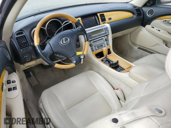 2002 Lexus SC 430 with VIN JTHFN48YX20007150, listed as a Copart auction lot 57253434 with 130,029 mi miles and Salvage Title. Bid and sale history available at DreamBid. Image 8.