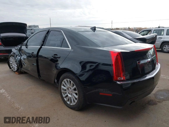 2010 Cadillac CTS with VIN 1G6DA5EGXA0138568, listed as a IAAI auction lot 41354741 with 173,253 mi miles and . Bid and sale history available at DreamBid. Image 3.