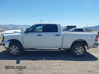 2024 Ram 2500 Big Horn with VIN 3C6UR5DJXRG275902, listed as a IAAI auction lot 42663645 with 29,066 mi miles and . Bid and sale history available at DreamBid. Image 14.