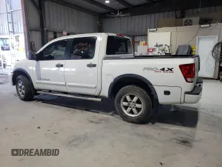 2010 Nissan Titan Pro-4X with VIN 1N6BA0EC3AN312601, listed as a Copart auction lot 52633455 with 161,260 mi miles and Salvage title. Bid and sale history available at DreamBid. Image 2.