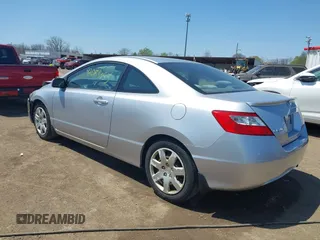2010 Honda Civic Cpe LX with VIN 2HGFG1B67AH535385, listed as a IAAI auction lot 42085053 with 150,803 mi miles. Bid and sale history available at carsss.com. Image 3.