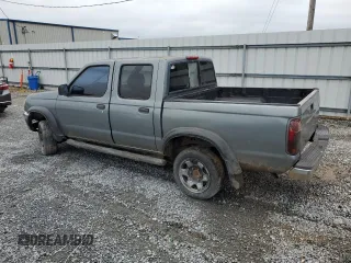2000 Nissan Frontier XE z VIN 1N6ED27T2YC311037, wystawiony jako Copart lot #57901285 z przebiegiem Nie podano mil oraz Szkoda całkowita • Salvage title. Historia ofert i sprzedaży dostępna na DreamBid. Obrazek 2.