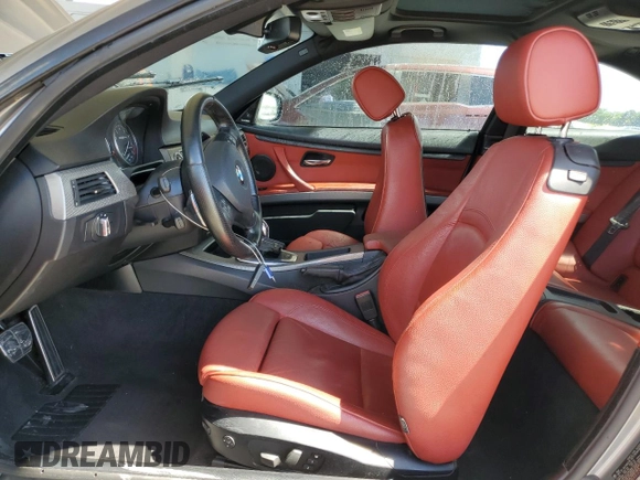 2011 BMW 3 Series 335is with VIN WBAKG1C52BE617713, listed as a Copart auction lot 74064204 with 132,742 mi miles and Salvage Title. Bid and sale history available at carsss.com. Image 7.