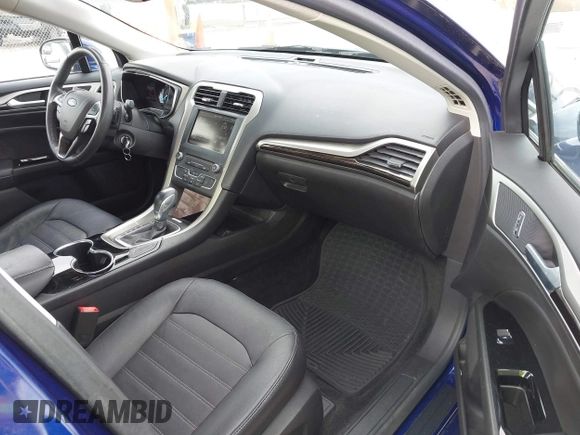2016 Ford Fusion SE with VIN 3FA6P0H97GR126736, listed as a IAAI auction lot 42199605 with 122,267 mi miles and . Bid and sale history available at DreamBid. Image 5.