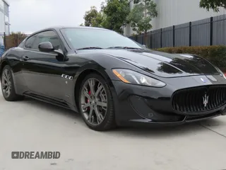 2013 Maserati GranTurismo Sport с VIN ZAM45VLAXD0072023, выставлен на аукционе Copart как лот 59033745 с пробегом 86 009 миль миль и Списание • Salvage title. История ставок и продаж доступна на DreamBid. Изображение 1.