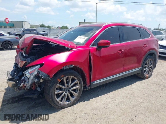 2019 Mazda CX-9 Grand Touring z VIN JM3TCADY5K0302436, wystawiony jako IAAI lot #42323545 z przebiegiem Nie podano mil oraz . Historia ofert i sprzedaży dostępna na DreamBid. Obrazek 2.