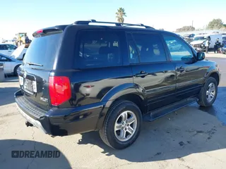 2003 Honda Pilot EX z VIN 2HKYF18713H612854, wystawiony jako IAAI lot #41344126 z przebiegiem 152 331 mil mil oraz . Historia ofert i sprzedaży dostępna na DreamBid. Obrazek 4.