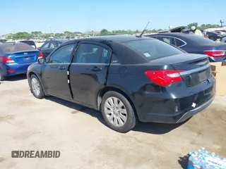 2014 Chrysler 200 LX with VIN 1C3CCBAB7EN208911, listed as a IAAI auction lot 41981884 with 144,239 mi miles and . Bid and sale history available at carsss.com. Image 3.