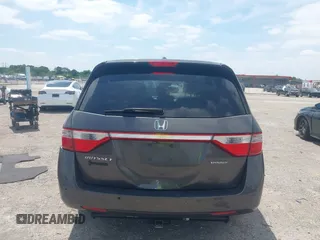 2012 Honda Odyssey Touring with VIN 5FNRL5H90CB088536, listed as a IAAI auction lot 42102008 with 283,350 mi miles and . Bid and sale history available at DreamBid. Image 16.