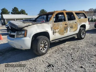 2011 Chevrolet Suburban z VIN 1GNWK5EG5BR230131, wystawiony jako Copart lot #82959184 z przebiegiem Nie podano mil oraz Szkoda całkowita • Salvage title. Historia ofert i sprzedaży dostępna na DreamBid. Obrazek 1.