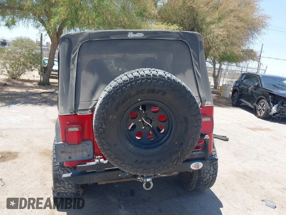 2000 Jeep Wrangler Sport with VIN 1J4FA49S0YP731544, listed as a IAAI auction lot 42570831 with Not provided miles and . Bid and sale history available at DreamBid. Image 17.