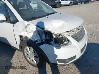 2013 Suzuki SX4 Crossover with VIN JS2YB5A39D6101193, listed as a IAAI auction lot 41675796 with 87,459 mi miles and . Bid and sale history available at DreamBid. Image 6.