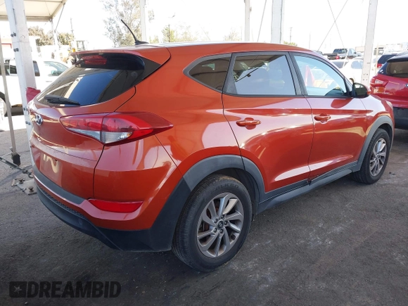 2017 Hyundai Tucson SE with VIN KM8J23A48HU357394, listed as a IAAI auction lot 41841968 with 74,769 mi miles. Bid and sale history available at carsss.com. Image 4.