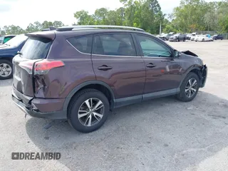 2017 Toyota RAV4 XLE with VIN 2T3WFREV5HW373141, listed as a IAAI auction lot 42091816 with 155,138 mi miles and . Bid and sale history available at DreamBid. Image 4.