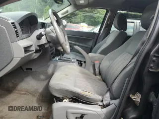 2005 Jeep Grand Cherokee Laredo с VIN 1J4HR48N25C604066, выставлен на аукционе Copart как лот 64397505 с пробегом 151 504 миль миль и Списание • Salvage title. История ставок и продаж доступна на DreamBid. Изображение 7.