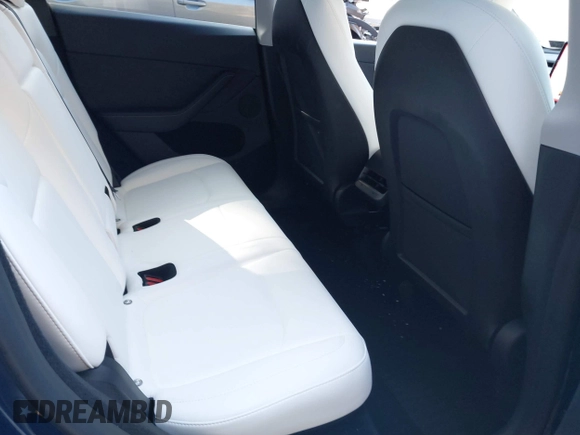 2024 Tesla Model Y Long Range with VIN 7SAYGDEE1RA266328, listed as a IAAI auction lot 40610351 with 13,573 mi miles. Bid and sale history available at carsss.com. Image 8.