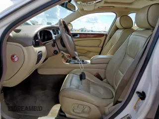 2006 Jaguar XJ Vanden Plas with VIN SAJWA82B16SH06996, listed as a Copart auction lot 62509025 with 80,236 mi miles and Salvage title. Bid and sale history available at DreamBid. Image 7.
