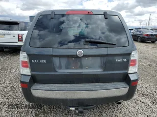 2008 Mercury Mariner z VIN 4M2CU91198KJ12447, wystawiony jako Copart lot #55319495 z przebiegiem 198 524 mil mil oraz Szkody całkowita. Historia ofert i sprzedaży dostępna na DreamBid. Obrazek 6.