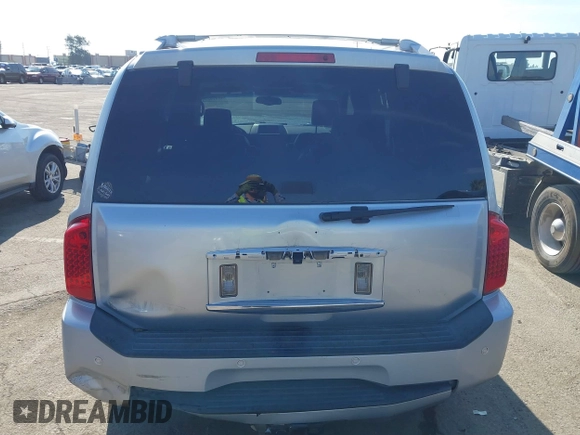 2004 Infiniti QX56 with VIN 5N3AA08CX4N810912, listed as a IAAI auction lot 41419673 with 169,057 mi miles. Bid and sale history available at carsss.com. Image 16.
