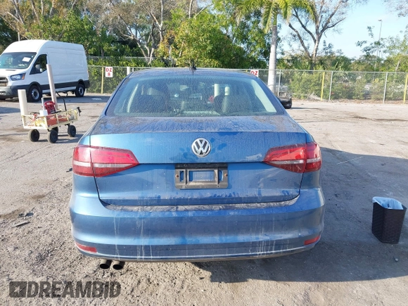 2016 Volkswagen Jetta Sedan 1.4T SE with VIN 3VWD67AJ0GM328412, listed as a IAAI auction lot 41556254 with 137,814 mi miles. Bid and sale history available at carsss.com. Image 16.