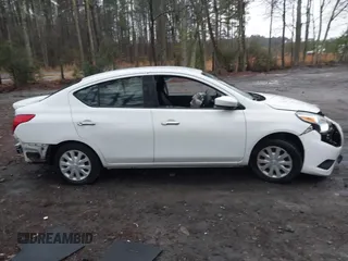 2016 Nissan Versa SV z VIN 3N1CN7APXGL879574, wystawiony jako IAAI lot #41510622 z przebiegiem 121 094 mil mil oraz . Historia ofert i sprzedaży dostępna na DreamBid. Obrazek 14.