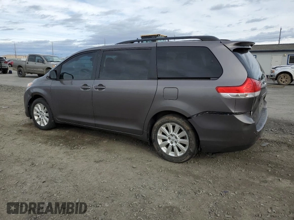 2014 Toyota Sienna LE with VIN 5TDJK3DC7ES073648, listed as a Copart auction lot 50554095 with 136,236 mi miles and Salvage Title. Bid and sale history available at DreamBid. Image 2.