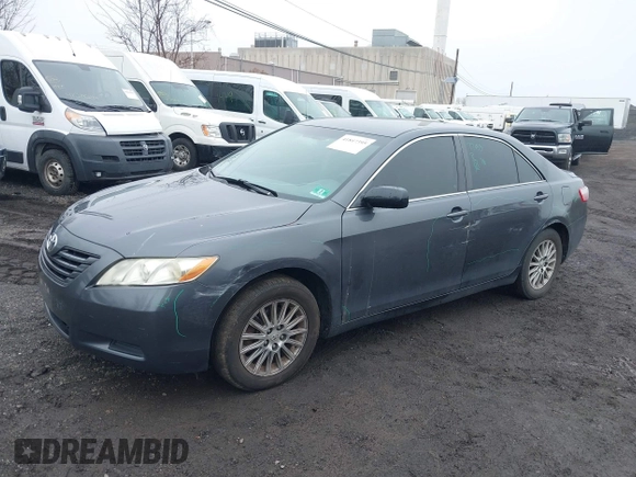2009 Toyota Camry LE z VIN 4T1BK46K49U093612, wystawiony jako IAAI lot #41847395 z przebiegiem 250 383 mil mil oraz . Historia ofert i sprzedaży dostępna na DreamBid. Obrazek 6.