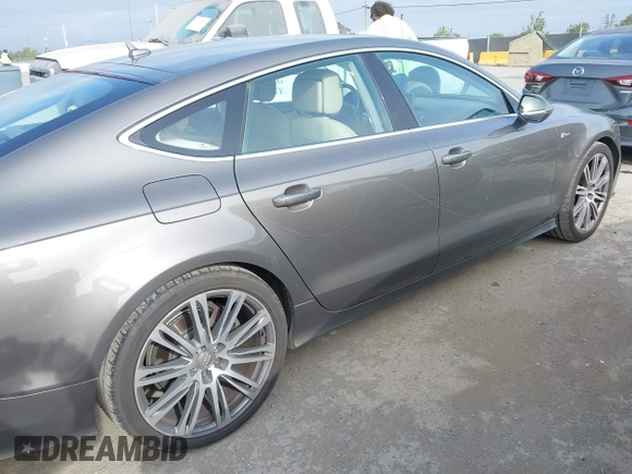 2012 Audi A7 Prestige с VIN WAU2GAFC7CN122113, выставлен на аукционе IAAI как лот 42111441 с пробегом 149 617 миль миль и . История ставок и продаж доступна на DreamBid. Изображение 6.