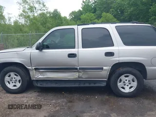 2004 Chevrolet Tahoe LT z VIN 1GNEC13Z74R233346, wystawiony jako IAAI lot #42095020 z przebiegiem 123 257 mil mil oraz . Historia ofert i sprzedaży dostępna na DreamBid. Obrazek 14.