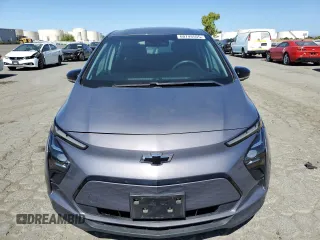 2023 Chevrolet Bolt EV 1LT with VIN 1G1FW6S05P4115360, listed as a Copart auction lot 60748555 with 69,678 mi miles and Salvage title. Bid and sale history available at DreamBid. Image 5.