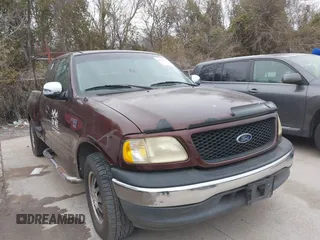 2001 Ford F-150 XL with VIN 2FTRX07W31CA59129, listed as a IAAI auction lot 41349352 with 272,026 mi miles. Bid and sale history available at carsss.com. Image 1.