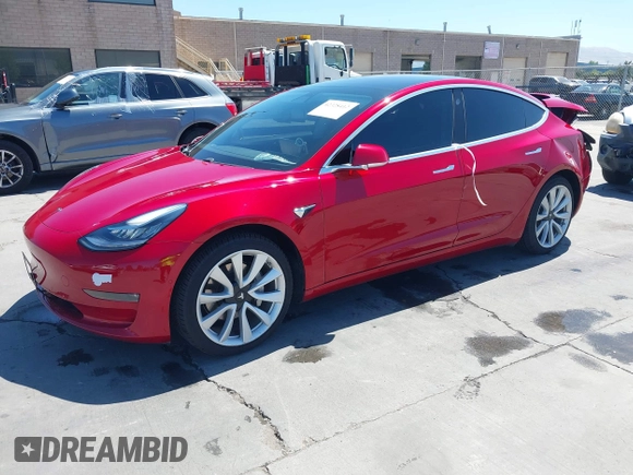 2018 Tesla Model 3 Long Range Battery z VIN 5YJ3E1EAXJF048839, wystawiony jako IAAI lot #42328412 z przebiegiem 83 083 mil mil oraz . Historia ofert i sprzedaży dostępna na DreamBid. Obrazek 19.