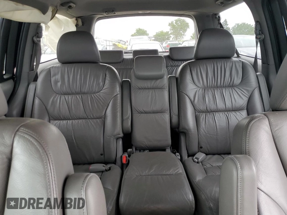 2008 Honda Odyssey EX-L z VIN 5FNRL38738B037025, wystawiony jako Copart lot #53354455 z przebiegiem 161 291 mil mil oraz Szkoda całkowita • Salvage title. Historia ofert i sprzedaży dostępna na DreamBid. Obrazek 10.