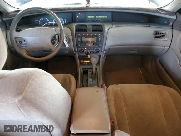 2000 Toyota Avalon XL z VIN 4T1BF28B3YU045264, wystawiony jako Copart lot #57519185 z przebiegiem 157 113 mil mil oraz Szkoda całkowita • Salvage title. Historia ofert i sprzedaży dostępna na DreamBid. Obrazek 8.