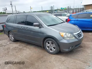 2010 Honda Odyssey Touring с VIN 5FNRL3H99AB111555, выставлен на аукционе IAAI как лот 42533626 с пробегом 239 186 миль миль и . История ставок и продаж доступна на DreamBid. Изображение 1.