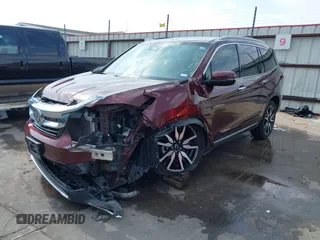 2019 Honda Pilot Touring 8-Passenger z VIN 5FNYF5H95KB009122, wystawiony jako IAAI lot #41573338 z przebiegiem 85 845 mil mil oraz . Historia ofert i sprzedaży dostępna na DreamBid. Obrazek 23.