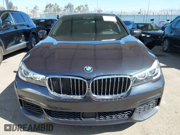 2019 BMW 7 Series 740i with VIN WBA7E2C53KB218375, listed as a IAAI auction lot 42008827 with 61,337 mi miles and . Bid and sale history available at DreamBid. Image 12.