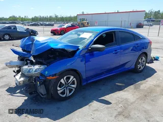 2018 Honda Civic LX with VIN 19XFC2F54JE027744, listed as a IAAI auction lot 42038398 with 119,250 mi miles and . Bid and sale history available at DreamBid. Image 2.