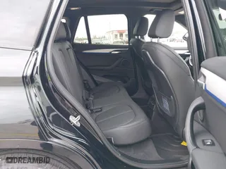 2021 BMW X1 sDrive28i with VIN WBXJG7C05M5U03116, listed as a IAAI auction lot 39837867 with 16,788 mi miles. Bid and sale history available at carsss.com. Image 8.