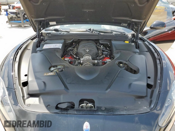 2014 Maserati GranTurismo Sport z VIN ZAM45VLAXE0083282, wystawiony jako Copart lot #61799155 z przebiegiem 71 517 mil mil oraz Szkoda całkowita • Salvage title. Historia ofert i sprzedaży dostępna na DreamBid. Obrazek 11.