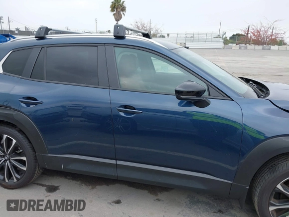 2024 Mazda CX-50 2.5 Turbo with VIN 7MMVABXY1RN237106, listed as a IAAI auction lot 42117311 with 3,135 mi miles and . Bid and sale history available at DreamBid. Image 13.
