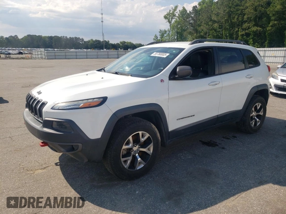 2014 Jeep Cherokee Trailhawk with VIN 1C4PJMBS5EW185510, listed as a Copart auction lot 55780005 with 130,358 mi miles and Clean title. Bid and sale history available at DreamBid. Image 1.