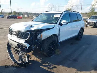 2023 Kia Telluride SX Prestige X-Pro with VIN 5XYP5DGC6PG351443, listed as a IAAI auction lot 41548694 with 32,665 mi miles and . Bid and sale history available at DreamBid. Image 2.
